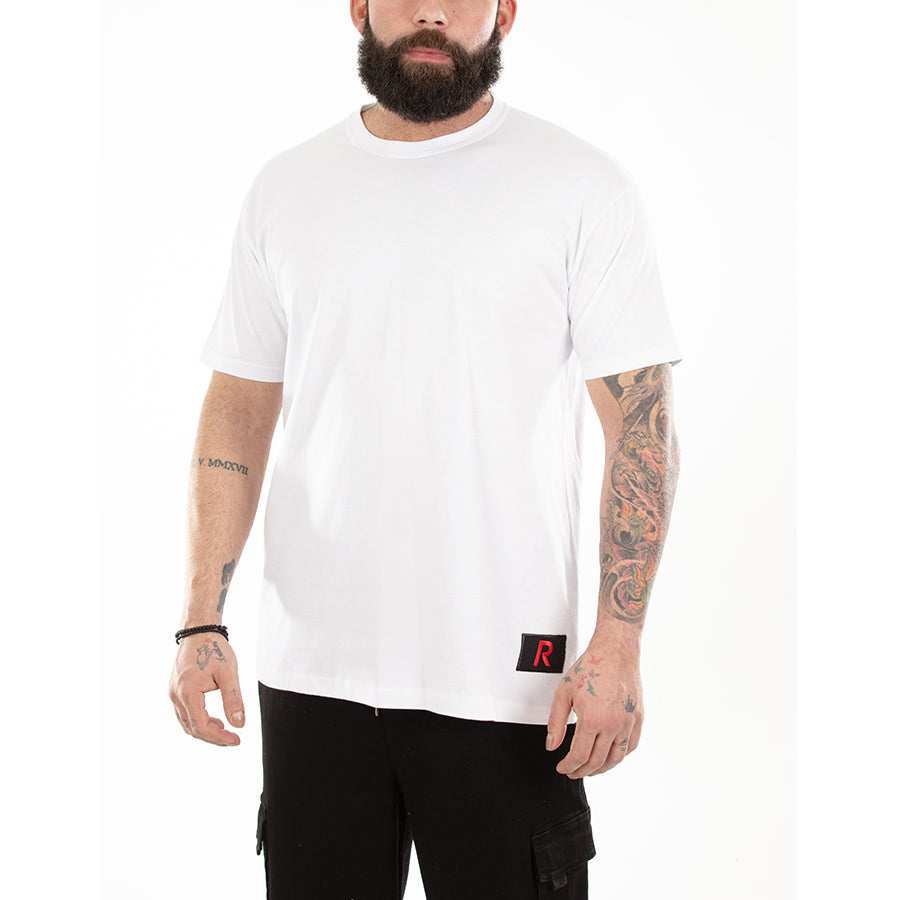 Front of White T-shirt with RangeTrotter "R" logo patch on bottom left